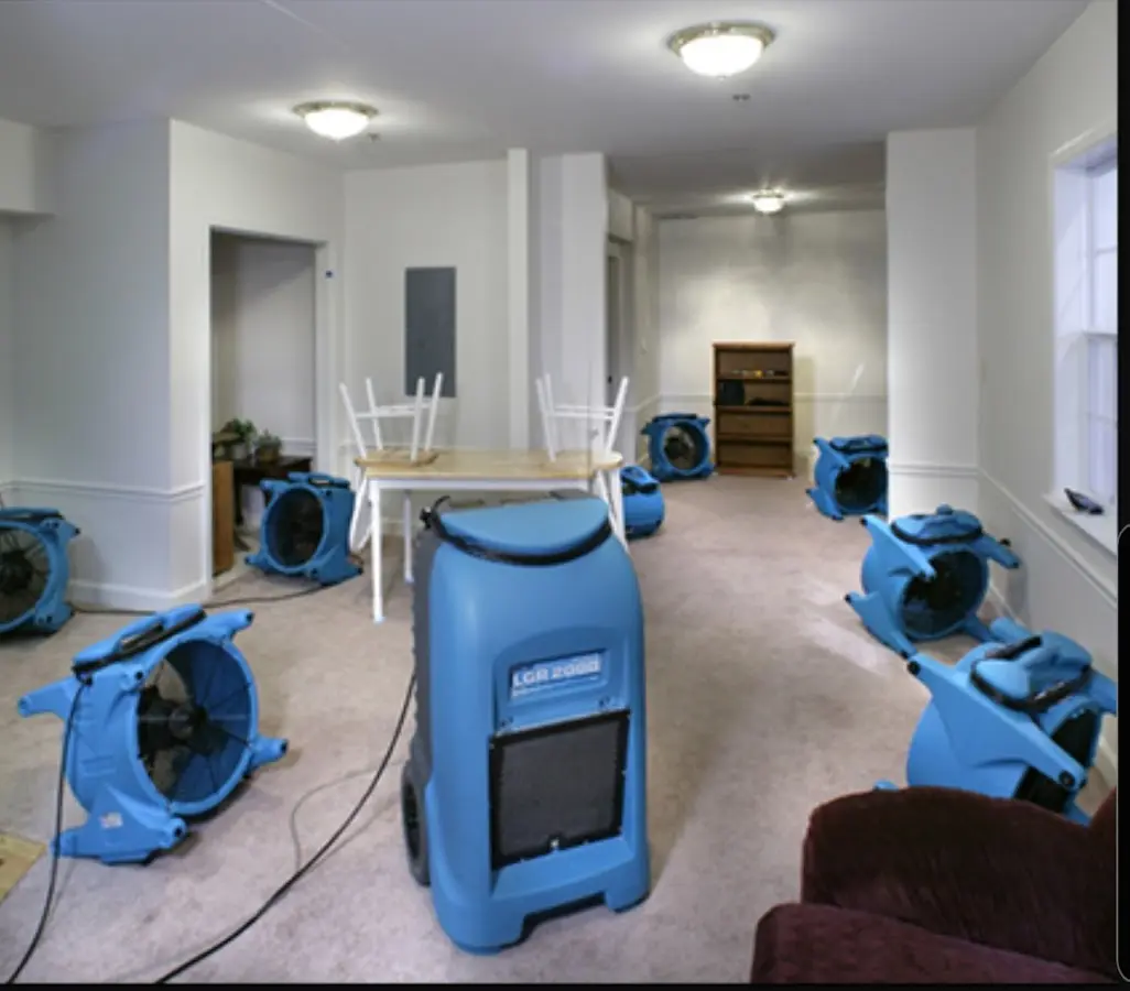 Air movers and dehumidifier setup for Water Damage Restoration in Schuyler Falls